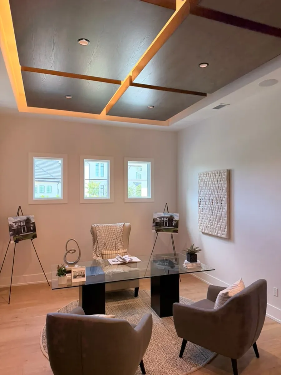 Home office finished with light engineered wood flooring