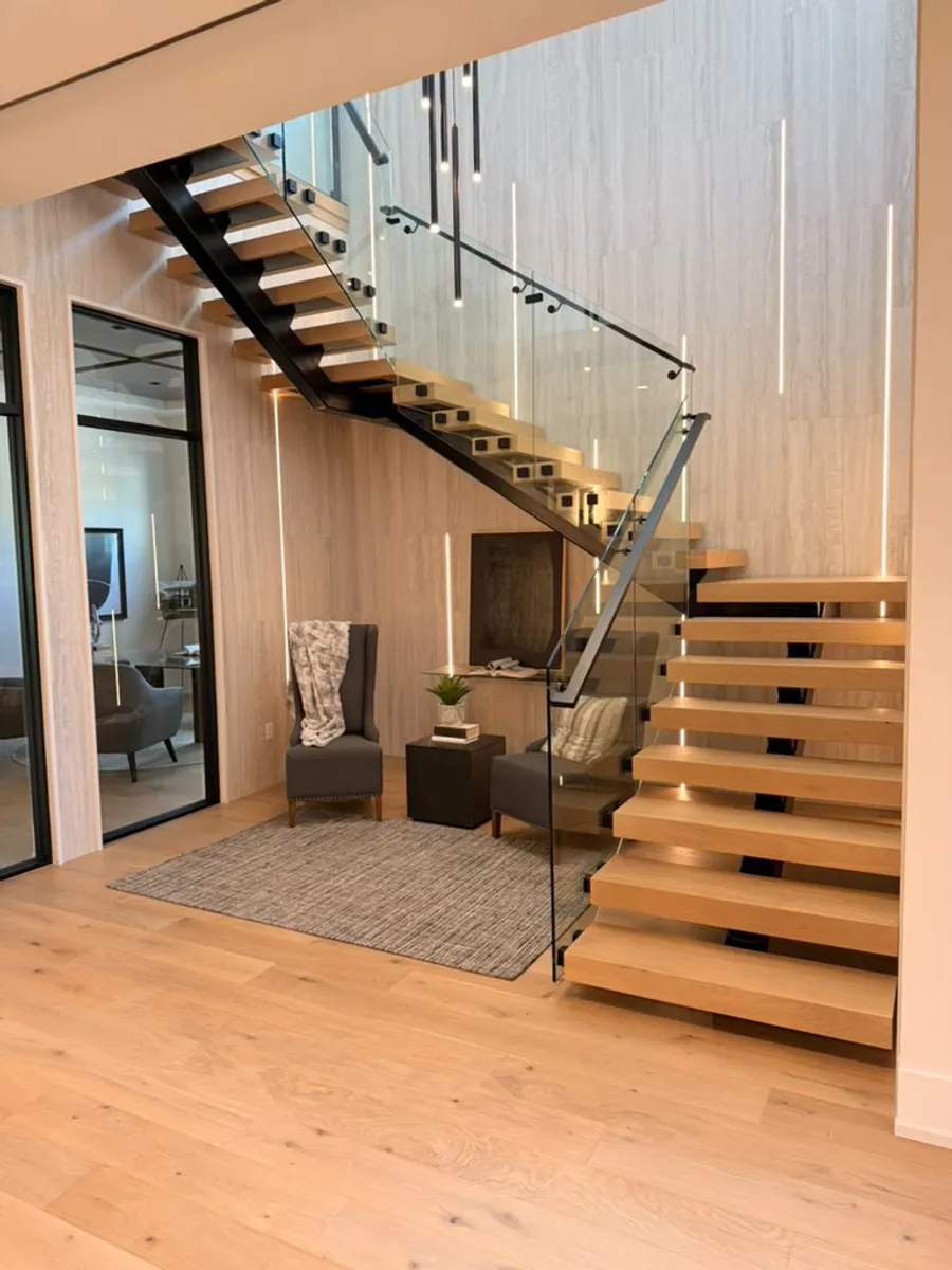 Floating staircase landing finished with engineered wood flooring