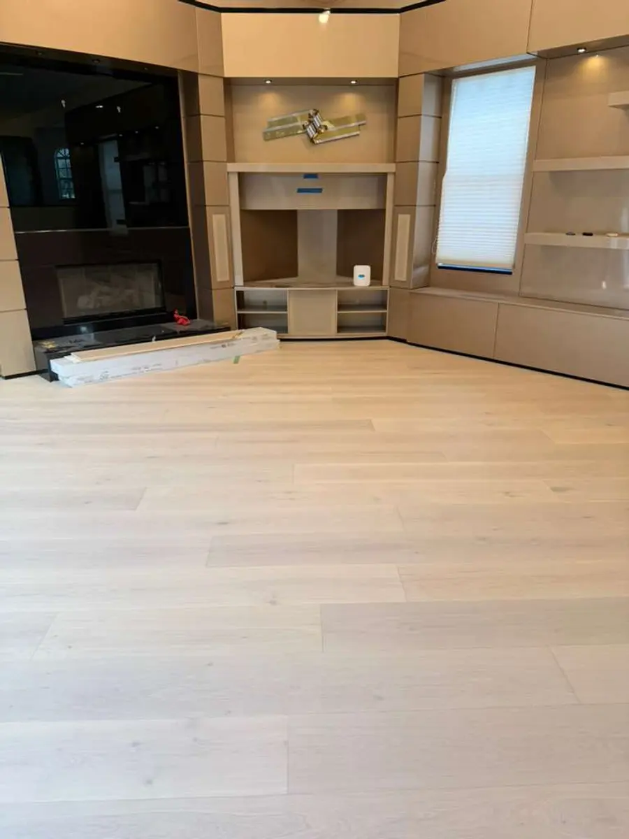 Great room finished with light wood-look flooring