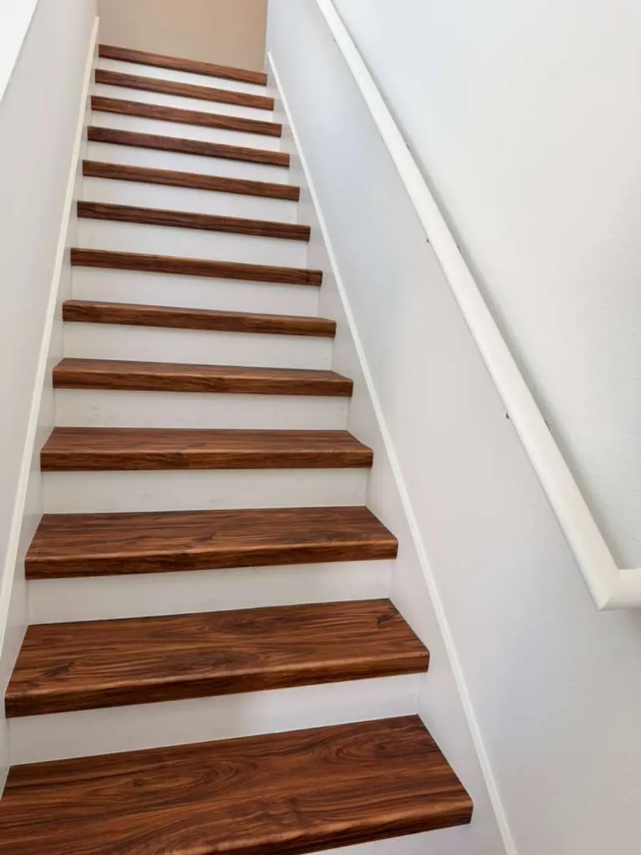 Staircase finished with rich wood treads
